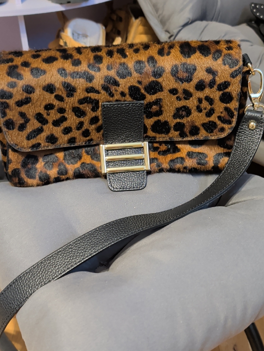 Leopard Print Faux Fur Crossbody with Black Strap and Gold Buckle